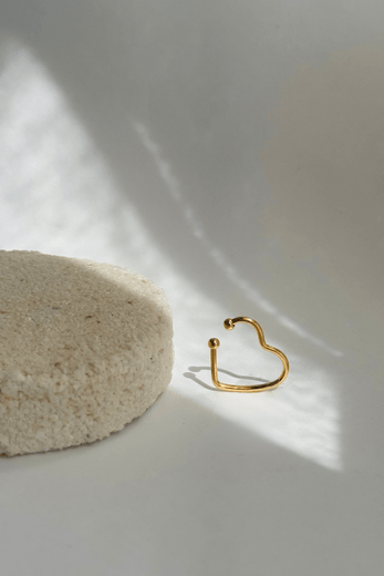 13189---piercing-dourado-formato-coracao.png